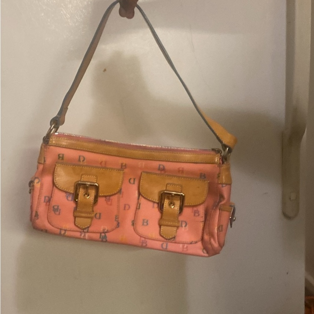 Dooney and Burke small clutch purse gently used